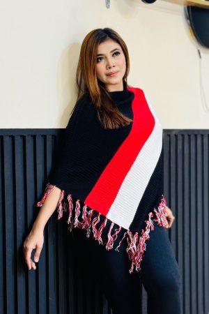 Toropy Premium winter poncho . Latest Designer Clothing for Women's and girl's. No 1 Premium Women's and Girls's Clothing Brand In bangladesh . WOOL Fabrics . Winter Friendly Dress. এই উলের পঞ্চটি শীতের ঠান্ডা থেকে আপনাকে উষ্ণ রাখবে। এর নরম টেক্সচার আপনাকে আরামদায়ক অনুভূতি দেবে। সাধারণ ডিজাইনের এই পঞ্চটি আপনার দৈনন্দিন পোশাকের সাথে সহজেই মানিয়ে নেবে। পঞ্চটি আপনাকে শীতের ফ্যাশন ট্রেন্ডে এগিয়ে রাখবে। এর সুন্দর ডিজাইন আপনাকে বিশেষ করে তুলবে। এই পঞ্চটি শুধু আপনাকে উষ্ণ রাখবে না, আপনার স্টাইলকেও আরও উজ্জ্বল করবে। নরম কাপড় এবং ফ্যাশনেবল ডিজাইন আপনাকে দিনভর আরামদায়ক রাখবে। উষ্ণ, আরামদায়ক, স্টাইলিশ, নরম, হালকা ওজন, দীর্ঘস্থায়ী, ফ্যাশনেবল, ঐতিহ্যবাহী, হাতে বোনা, উল, ক্যাশ্মির, ফ্লিস, এক্রিলিক, শীত, তুষার, ঠান্ডা