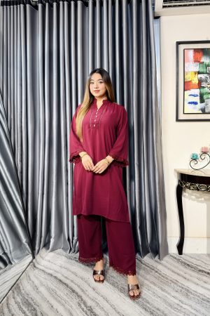 Women wearing elegant burgundy two piece kurti and palazzo set from Toropy ladies collection